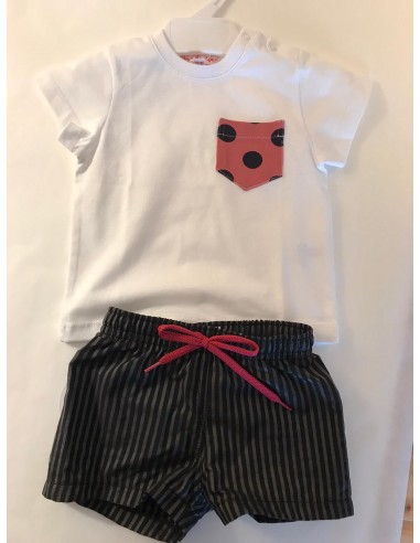 T-shirt vianca con taschiono a pois